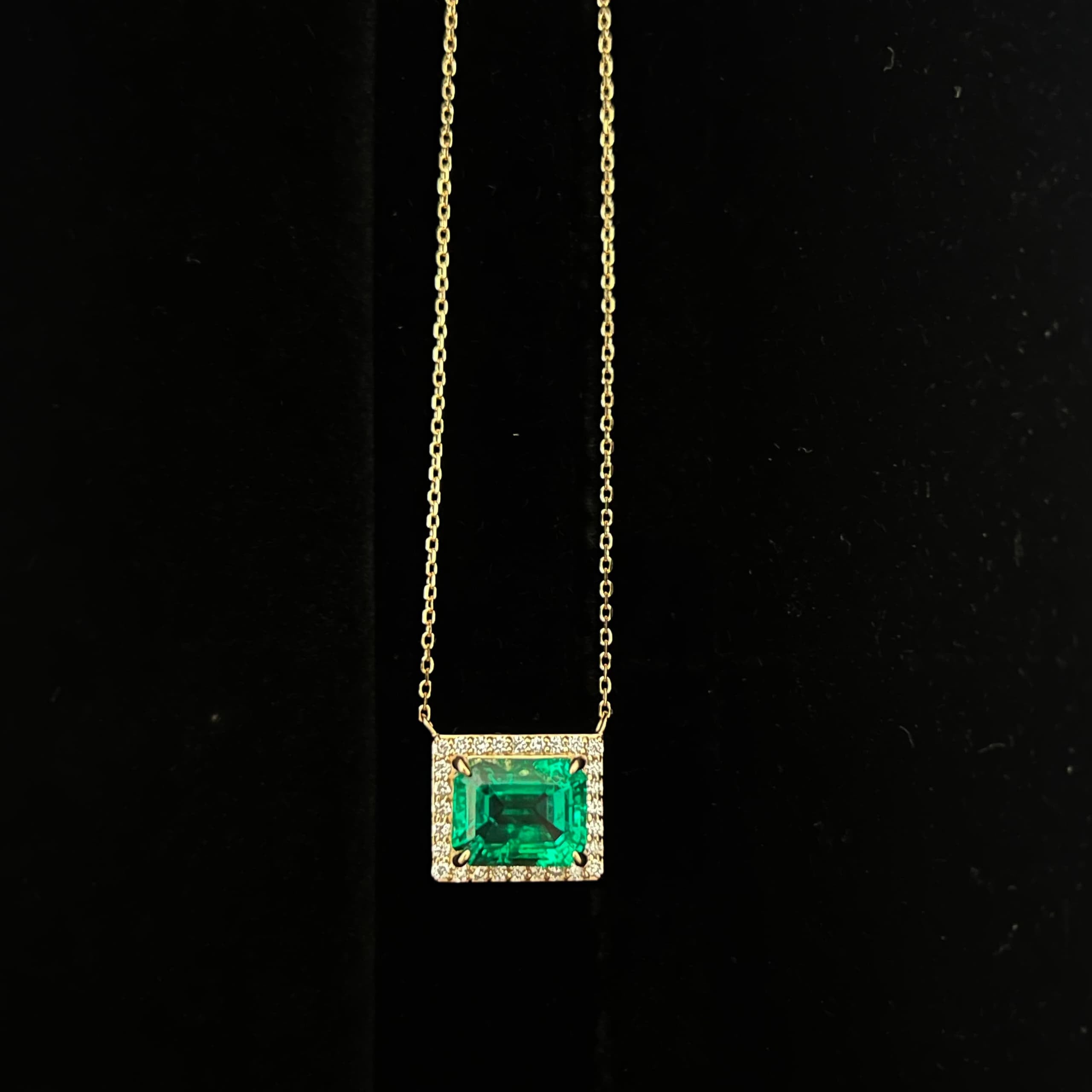 Emerald & Diamond Halo Necklace in 18k Gold | Manjam Bahrain