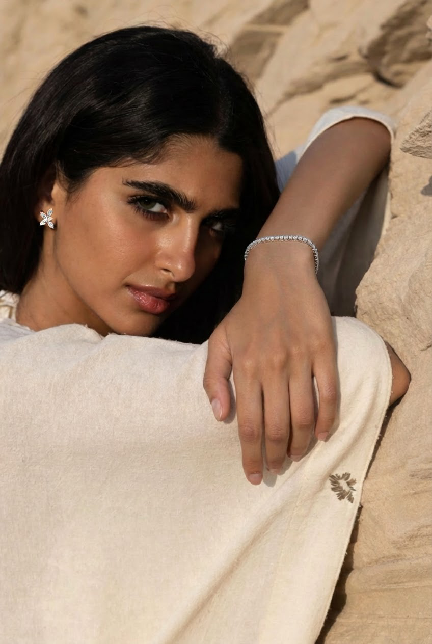woman wearing a diamond tennis bracelet 