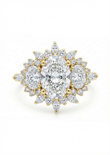 Gold and diamond ring on a white background