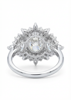 Diamond ring with a central gemstone and surrounding diamonds on a white background
