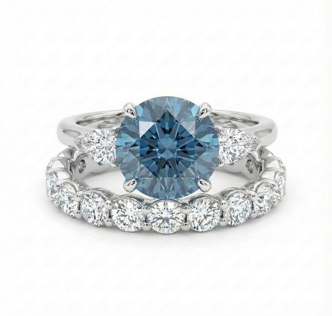 Blue diamond ring with a full eternity diamond band on a white background