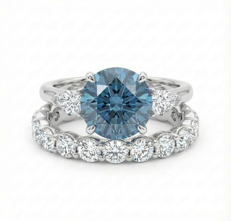 Blue diamond ring with a full eternity diamond band on a white background