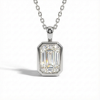 Emerald cut diamond pendant necklace on a white background