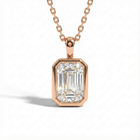Rose gold necklace with a diamond pendant on a white background