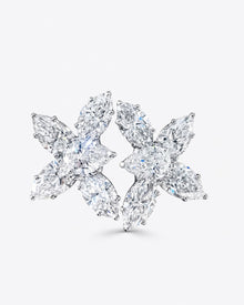 Pair of diamond earrings on a white background