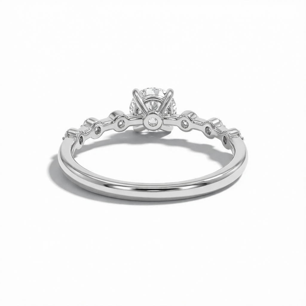 Silver ring with a diamond on a white background