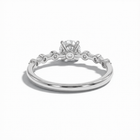 Silver ring with a diamond on a white background