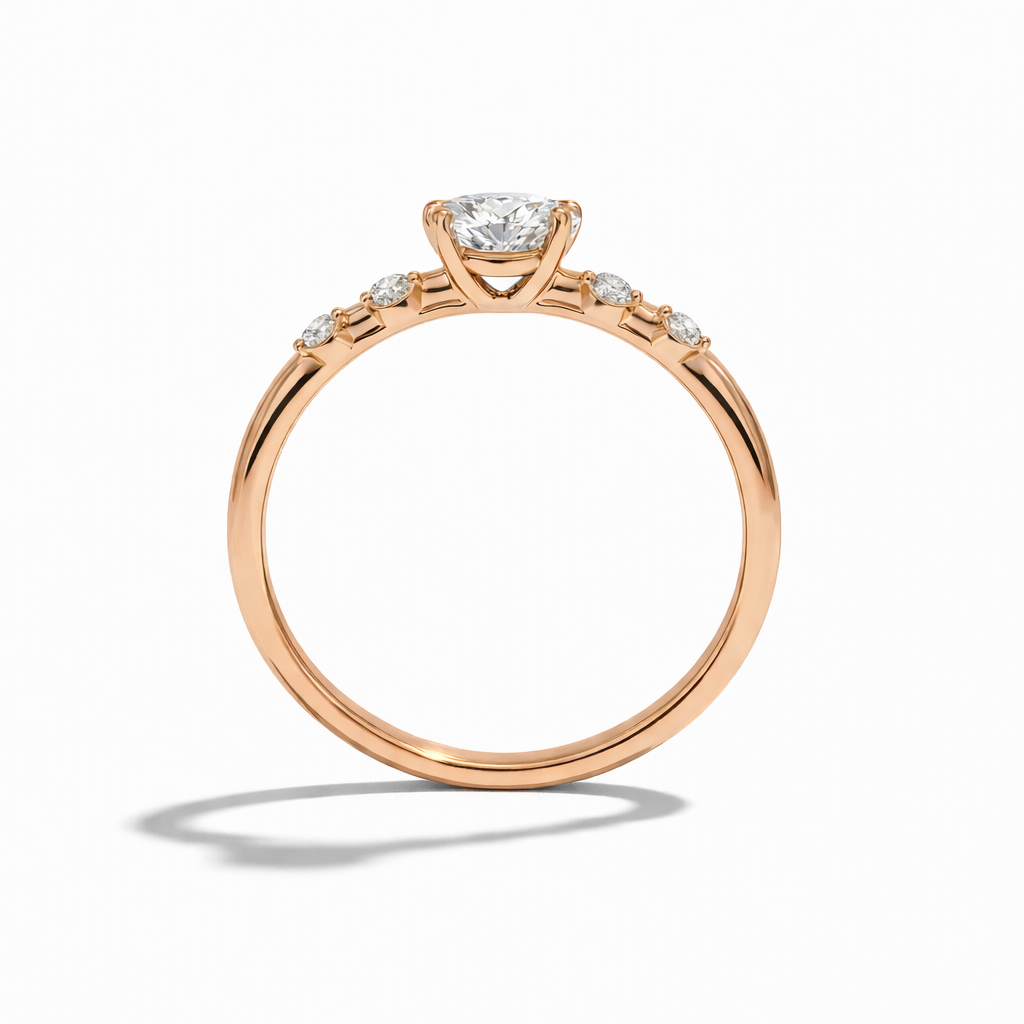 Rose gold diamond ring on a white background