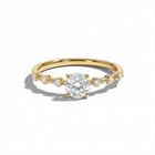 Gold ring with a diamond on a white background