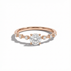 Rose gold ring with a diamond on a white background