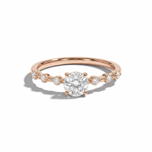 Rose gold ring with a diamond on a white background