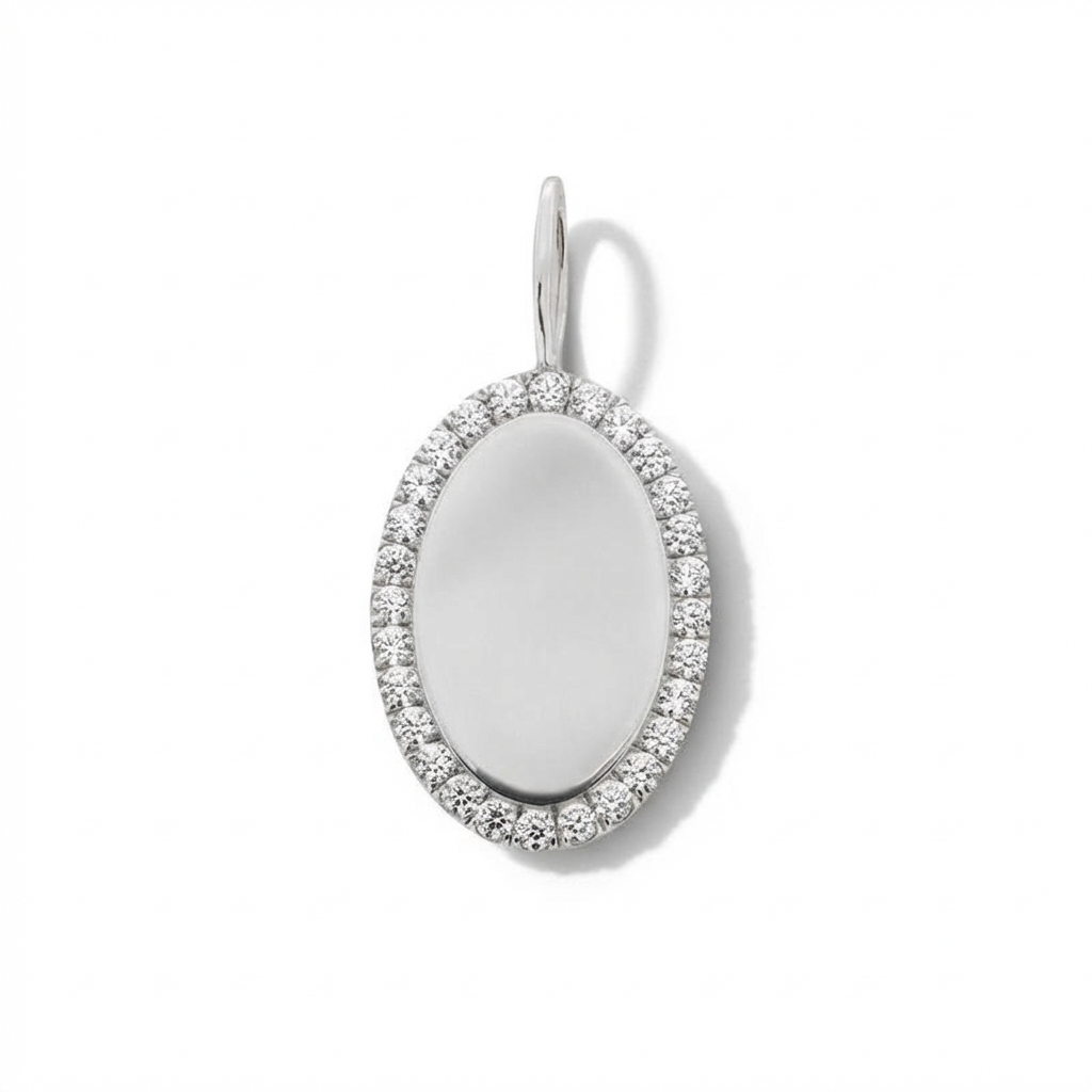 Silver pendant with a white stone and diamond accents on a white background