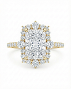 Diamond ring with a large central radiant cut diamond with a diamond halo in yellow gold on a white background
