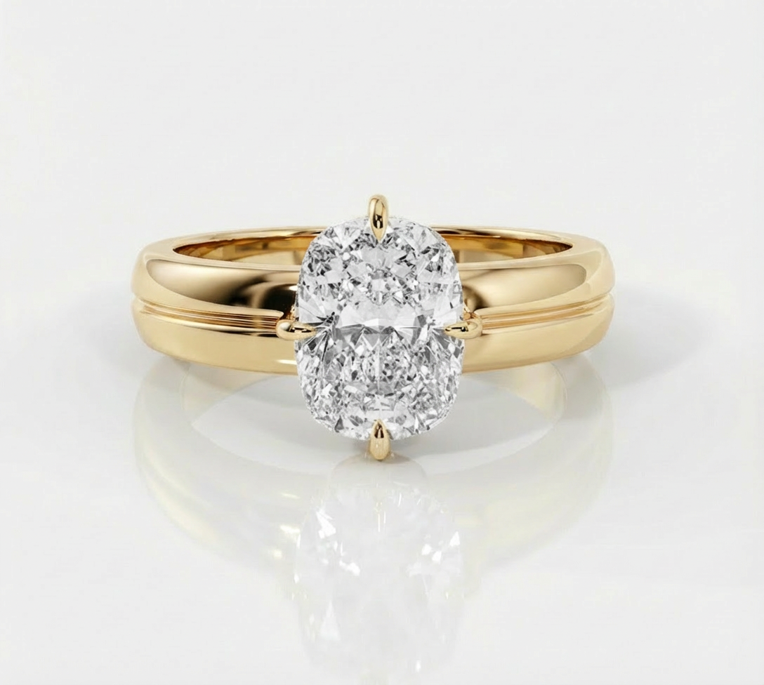 Gold ring with a large diamond on a white background