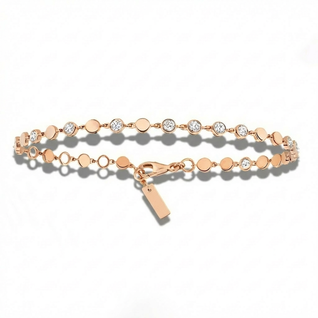 Rose gold bracelet with small round beads and a tag on a white background