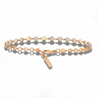 Rose gold bracelet with small round beads and a tag on a white background