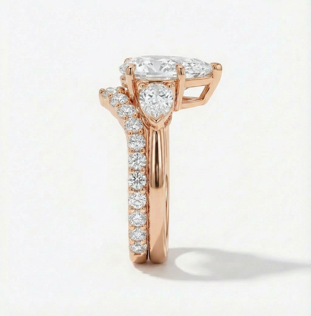 Rose gold ring with a diamond heart and surrounding diamonds on a light background