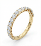 Gold wedding band rwith diamonds on a white background
